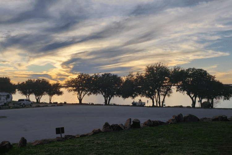 Lake Buchanan RV & Cabin Resort Boat ramp at sunset with trees